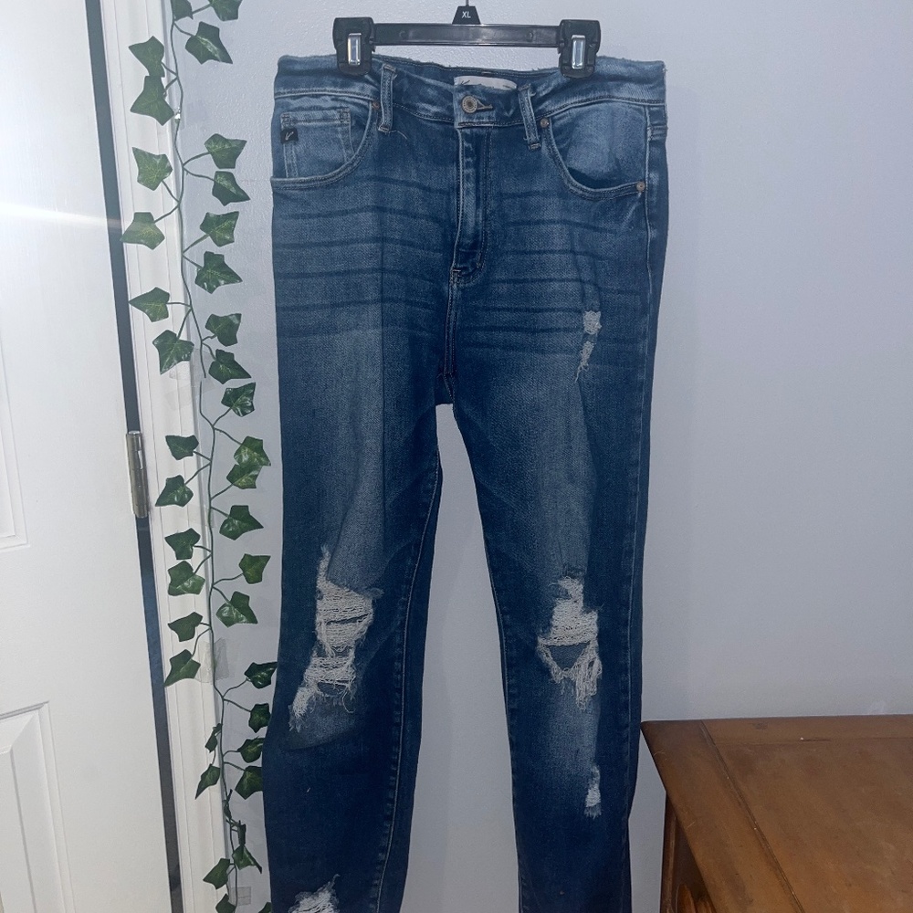 Ripped blue jeans